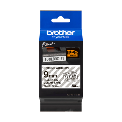 BROTHER TZE-S121 černá na průhledné permanentní 9 mm